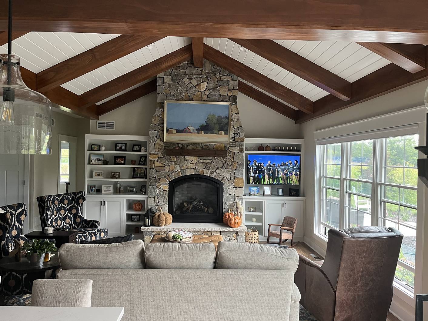Modern Rustic image of living room  with fireplace and sofas in Mikkelson Built custom home.