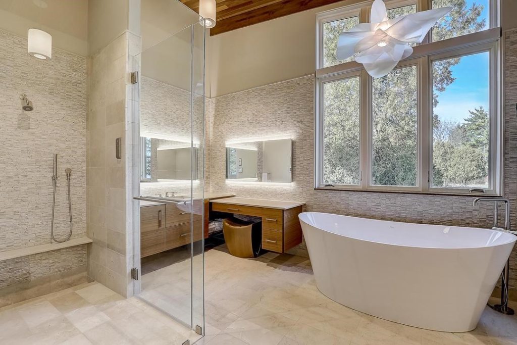Interior view of Bath Room in Modern Prairie Design custom home, Das Falter Haus (The Butterfly House) designed and built by Mikkelson Builders